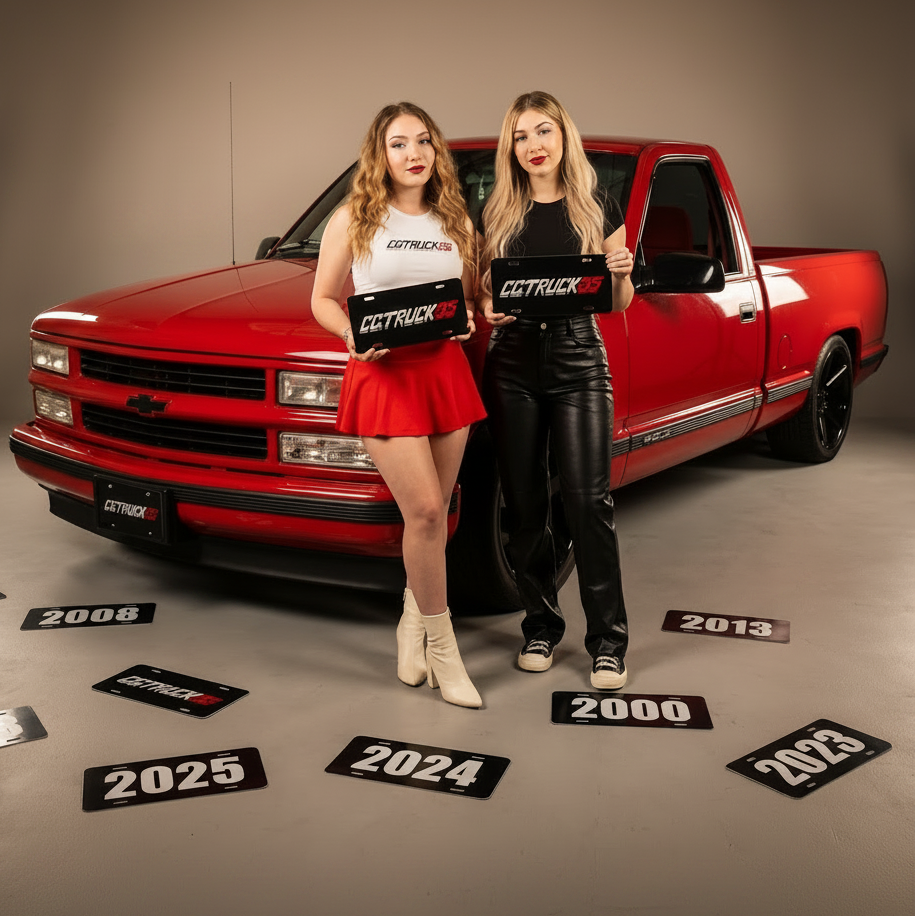 Two women standing in front of a red truck with 'CGTRUCKSS' branding, surrounded by years on the floor.